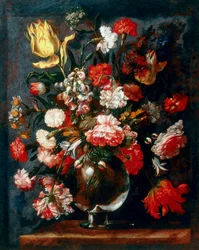Glass vase with a bunch of carnations